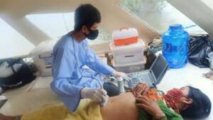 Ultrasound scanning aboard the TLC-4. It's private