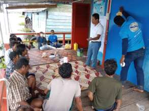 Working with men identified by the village chief