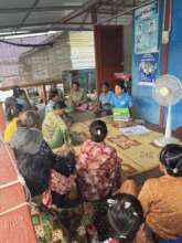 Team Leader, SreyNeth, teaching a group of mothers