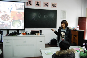 Volunteer Winnie teaches at Paitou middle school