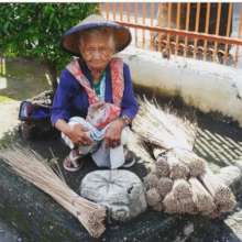 Granny Ajowiyono Sell Bamboo Broom