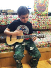 Phoenix Playing the Ukulele
