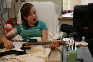 Teen Playing Guitar