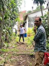 Volunteers helping cleaning the garden
