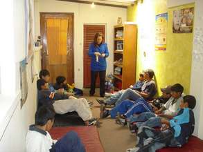 A Psychologist with Students in the Therapy Room