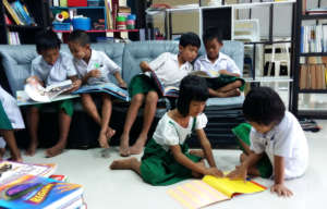 Kids reading in the renewed library