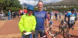 Jan and a beneficiary at the Cape Town Cycle Tour