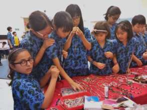 Learning About Jewelry at Cirendeu Handicrafts.