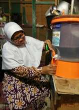 Aminah and her family enjoy their water filter pot