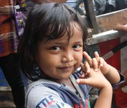 Desti Lives with her Mother at the Jakarta Dump