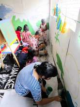 Watching the Designers Paint the Wall