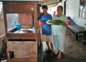 Heri and Wife, Sani Prepare the Food