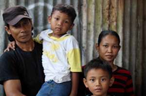 Rahmat, His Brother Denden, Mom and Dad