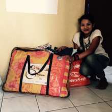 Nur is Shy. She Received Household Items.