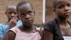 Girls in trailer taking shelter at Safe House