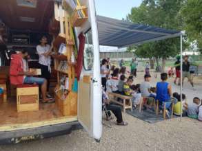 Busy library w/ Clowns Without Borders in Oinofyta