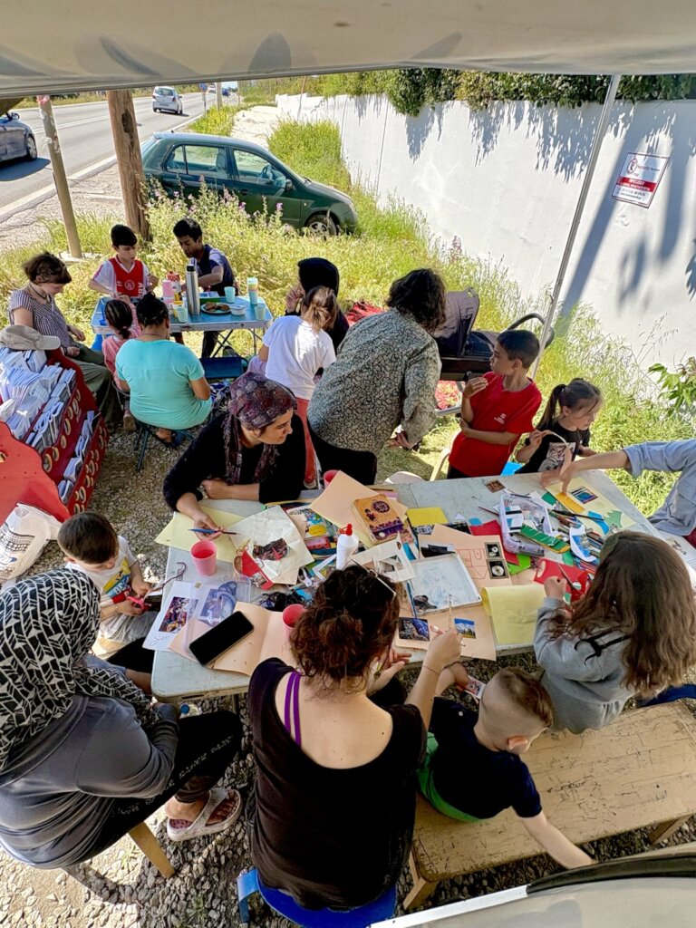 a busy session with collaging and kids at Oinofyta