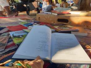 bilingual poetry at the community day in June