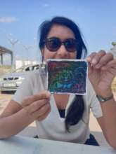 volunteer Tulsi shows off her handy work