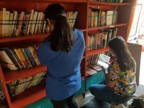 Zahra and Luliana browse in Victoria Square