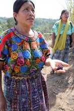Francisca proudly shows off her blackberries