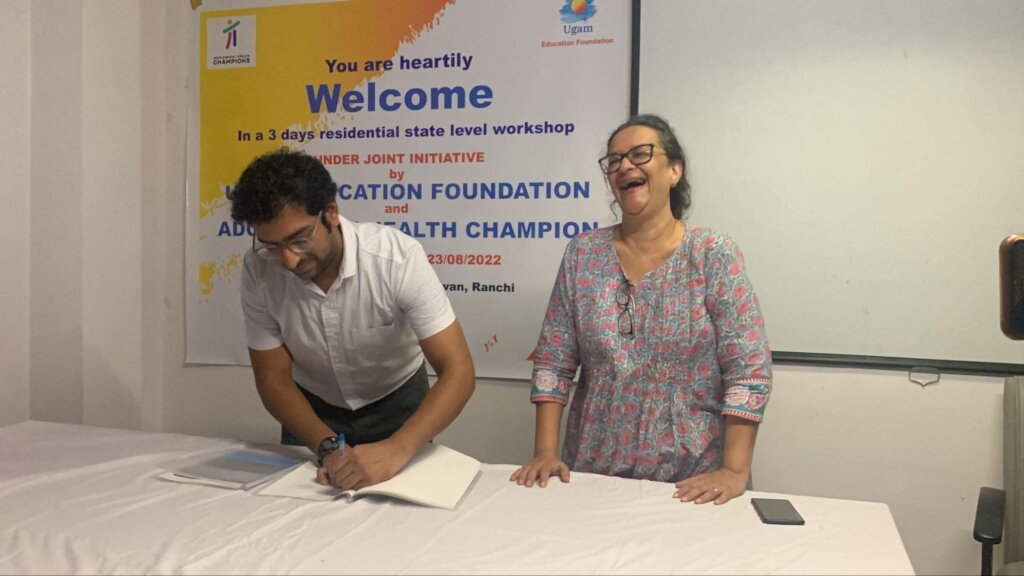 Ricky signing MOU with Lopa Gandhi, UEF Founder