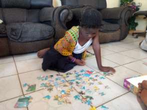 Jigsaw time at the Kimbilio girls home!