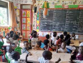 Classroom full of excited children.