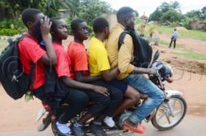 Going home from University on the Boda-Boda.