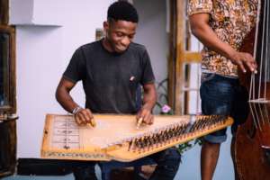 A DCMA student learns to play the qanun