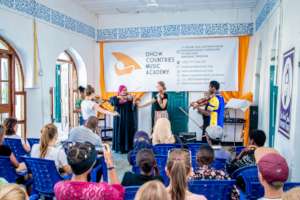 DCMA teachers and students in a live performance