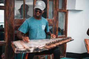 A DCMA student learns to play the qanun