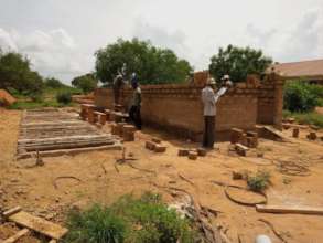 Boys' toilets with adjacent secondary waste pit