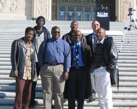 Exonerees on capitol steps