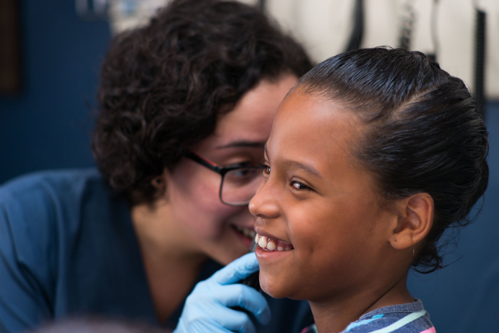 Girl receiving medical care