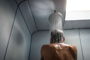 Homeless at 61, Ali takes a shower after 3 months