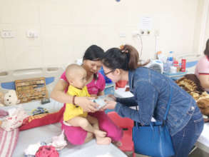 Pediatric patient and voluteer
