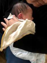 Our nanny holding baby