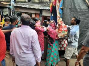Distributing monthly groceries to sex workers