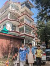 Dishi w/ her family in front of the Kranti home.