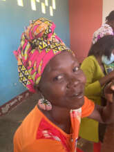 A Sister Modeling Earrings made in Aftercare