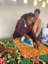 Rosa learning to iron