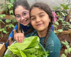 Sara and Lara on their rooftop in Shatila