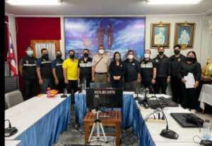 Group photo of our team and TICAC Police