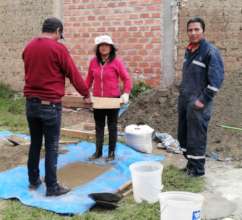 Monica, Rodrigo & Rene sieve sand before lockdown