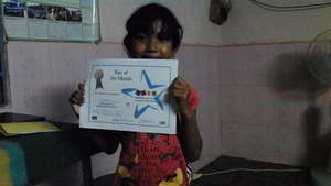 Somalin Showing Off Her Certificate