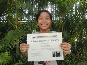 Vattana with her scholarship certificate!