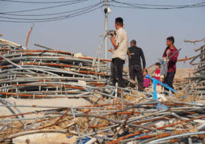 Gathering discarded material to build shelters