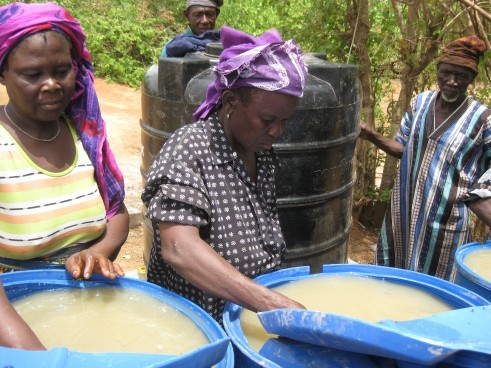 Samata and Kukuna treating water in Cheko