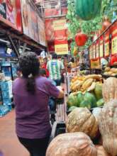 Our staff shopping in Antigua for food baskets
